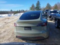 2021 Tesla Model Y — photo 16 of 18 | VIN 5YJYGAEE2MF145413