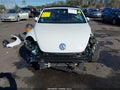 2015 Volkswagen Beetle — photo 13 of 17 | VIN 3VW517AT8FM808037