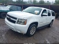 2007 Chevrolet Suburban 1500 — photo 2 of 12 | VIN 1GNFC16057J359323