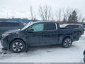 2017 Honda Ridgeline — photo 14 of 16 | VIN 5FPYK3F5XHB019726