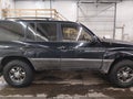 2002 Lexus LX 470 — photo 14 of 17 | VIN JTJHT00WX23515388