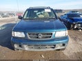 2000 Honda Passport — photo 12 of 16 | VIN 4S6DM58WXY4409397