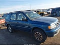 2000 Honda Passport — photo 13 of 16 | VIN 4S6DM58WXY4409397