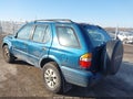 2000 Honda Passport — photo 3 of 16 | VIN 4S6DM58WXY4409397