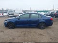 2014 Volkswagen Jetta — photo 14 of 16 | VIN 3VWD17AJ2EM277572