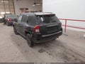 2015 Jeep Compass — photo 3 of 17 | VIN 1C4NJCBA7FD379865