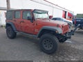 2014 Jeep Wrangler Unlimited — photo 1 of 17 | VIN 1C4BJWDG7EL297838