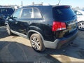 2011 Kia Sorento — photo 3 of 11 | VIN 5XYKUDA2XBG182775