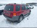 2004 Ford Escape — photo 4 of 17 | VIN 1FMYU03104KB09608