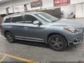 2017 Infiniti QX60 — photo 13 of 16 | VIN 5N1DL0MN8HC549918