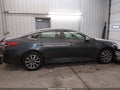 2019 Kia Optima — photo 13 of 16 | VIN 5XXGT4L30KG378873