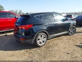 2015 Hyundai Santa Fe — photo 4 of 17 | VIN 5XYZW4LA3FG293705