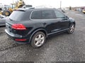 2013 Volkswagen Touareg — photo 4 of 17 | VIN WVGEF9BP2DD006220