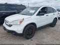 2009 Honda CR-V — photo 2 of 16 | VIN 5J6RE38579L012596