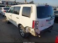 2014 Honda Pilot — photo 3 of 17 | VIN 5FNYF3H22EB016525