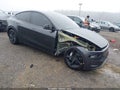 2026 Tesla Model Y — photo 1 of 20 | VIN 7SAYGDEE1TA587485