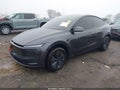 2026 Tesla Model Y — photo 2 of 20 | VIN 7SAYGDEE1TA587485