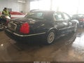 2003 Lincoln Town Car — photo 4 of 11 | VIN 1LNHM82W43Y623338