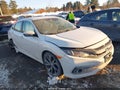2019 Honda Civic — photo 1 of 16 | VIN 2HGFC2E86KH521820