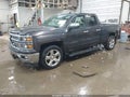 2015 Chevrolet Silverado 1500 — photo 2 of 16 | VIN 1GCVKREC3FZ244527