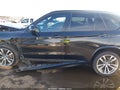 2014 BMW X5 — photo 14 of 16 | VIN 5UXKR0C59E0K48825