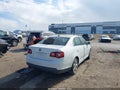 2009 Volkswagen Jetta — photo 4 of 16 | VIN 3VWRM71K19M077813