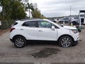 2020 Buick Encore — photo 13 of 16 | VIN KL4CJASB0LB032822