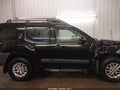 2014 Nissan Xterra — photo 13 of 16 | VIN 5N1AN0NW9EN801941