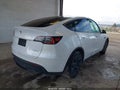 2024 Tesla Model Y — photo 4 of 15 | VIN 7SAYGDEE7RF160579