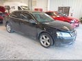 2012 Volkswagen Passat — photo 1 of 16 | VIN 1VWBN7A32CC034923
