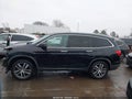 2016 Honda Pilot — photo 15 of 18 | VIN 5FNYF5H99GB037710