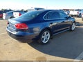2014 Volkswagen Passat — photo 4 of 16 | VIN 1VWBT7A36EC030883