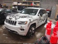 2014 Jeep Grand Cherokee — photo 2 of 16 | VIN 1C4RJFCGXEC396282