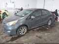 2012 Kia Rio — photo 2 of 16 | VIN KNADN4A31C6084282