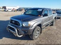 2014 Toyota Tacoma — photo 2 of 16 | VIN 5TFJU4GN8EX059667