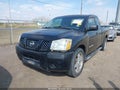 2005 Nissan Titan — photo 6 of 11 | VIN 1N6BA06A05N549906