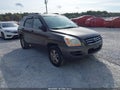 2006 Kia Sportage — photo 1 of 11 | VIN KNDJF723667166249