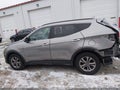 2016 Hyundai Santa Fe — photo 15 of 17 | VIN 5XYZUDLBXGG320320
