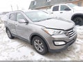 2016 Hyundai Santa Fe — photo 1 of 17 | VIN 5XYZUDLBXGG320320