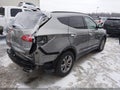 2016 Hyundai Santa Fe — photo 4 of 17 | VIN 5XYZUDLBXGG320320