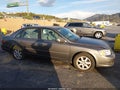 2004 Toyota Avalon — photo 13 of 16 | VIN 4T1BF28B74U358862