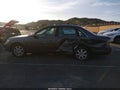 2004 Toyota Avalon — photo 14 of 16 | VIN 4T1BF28B74U358862