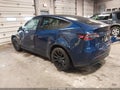 2022 Tesla Model Y — photo 3 of 18 | VIN 7SAYGDEE4NF447310
