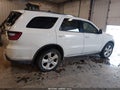 2014 Dodge Durango — photo 13 of 16 | VIN 1C4RDJAG6EC419540
