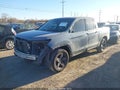2022 Honda Ridgeline — photo 2 of 17 | VIN 5FPYK3F87NB034836