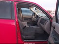 2009 Ford Escape — photo 5 of 20 | VIN 1FMCU03799KA15927