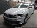 2017 Volkswagen Jetta — photo 2 of 11 | VIN 3VW2B7AJ8HM323821