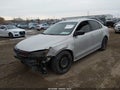 2014 Volkswagen Jetta — photo 2 of 11 | VIN 3VW2K7AJ1EM318004
