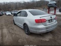 2014 Volkswagen Jetta — photo 3 of 11 | VIN 3VW2K7AJ1EM318004
