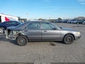 2000 Mazda 626 — photo 13 of 18 | VIN 1YVGF22C2Y5109875